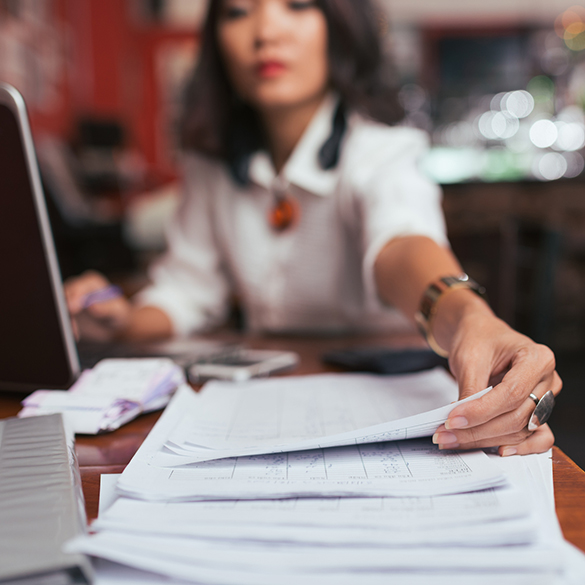 Bill Paying Made Simple with Salem Five Online Banking Woman at desk paying bills